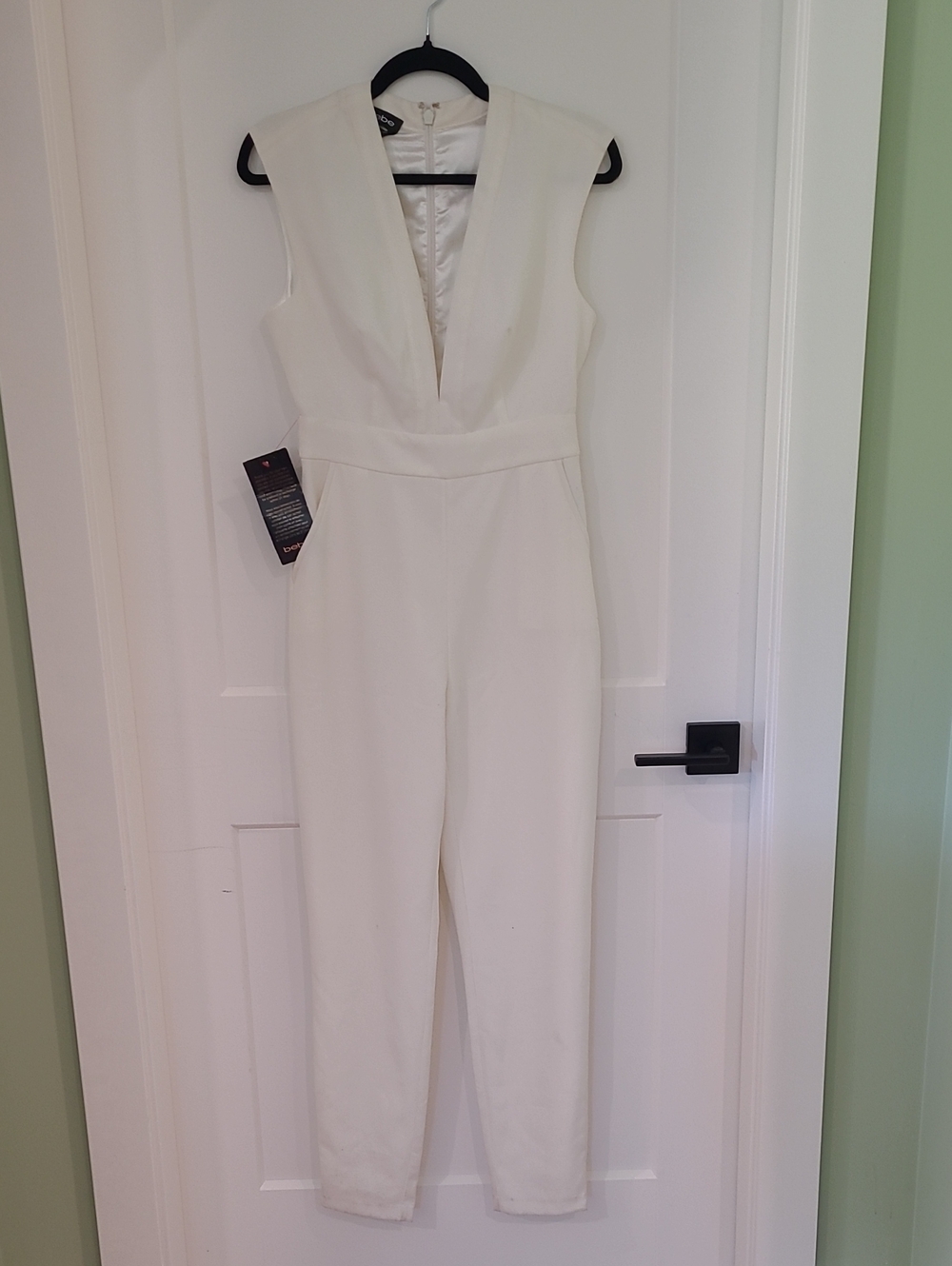 bebe Cream Deep V-Neck Sleeveless Jumpsuit NWT